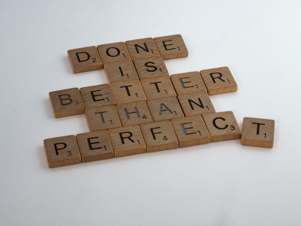 Confessions From A Recovering Perfectionist brown wooden blocks on white table
